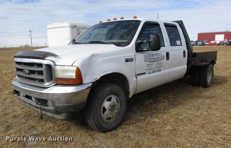 image for item DB6647 2001 Ford F350 Super Duty Crew Cab flatbed pickup truck