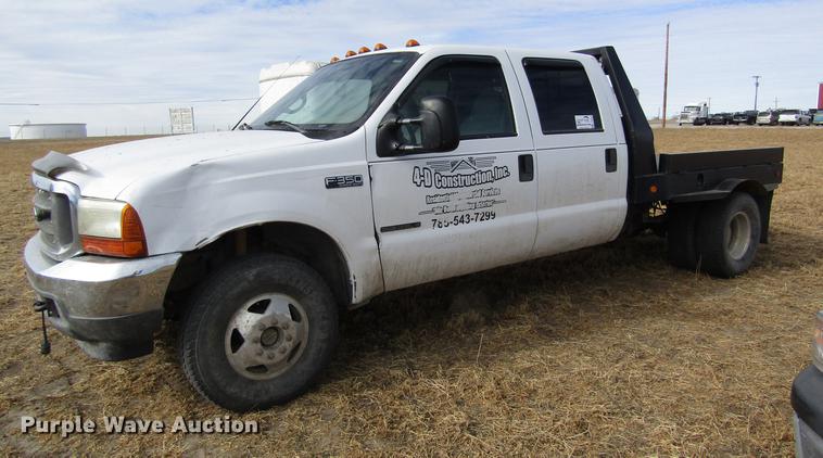 image for item DB6647 2001 Ford F350 Super Duty Crew Cab flatbed pickup truck