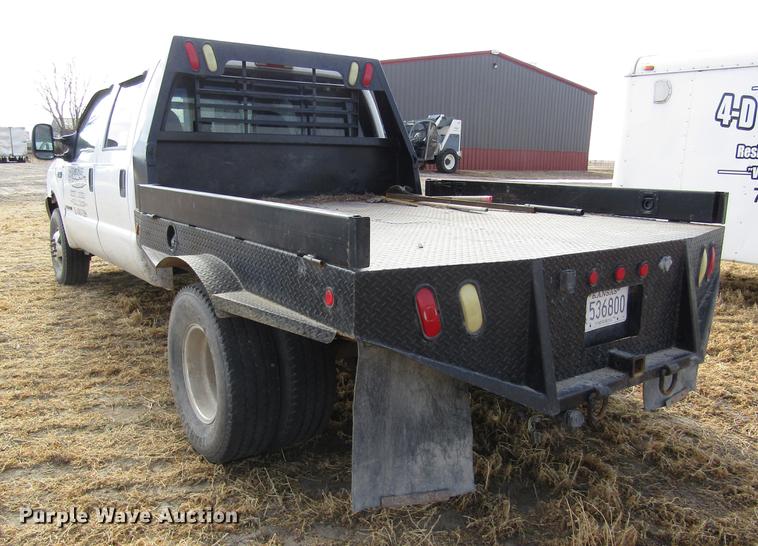 image for item DB6647 2001 Ford F350 Super Duty Crew Cab flatbed pickup truck