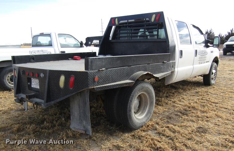 image for item DB6647 2001 Ford F350 Super Duty Crew Cab flatbed pickup truck