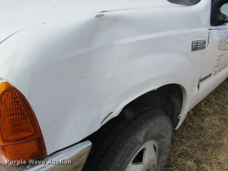 image for item DB6647 2001 Ford F350 Super Duty Crew Cab flatbed pickup truck