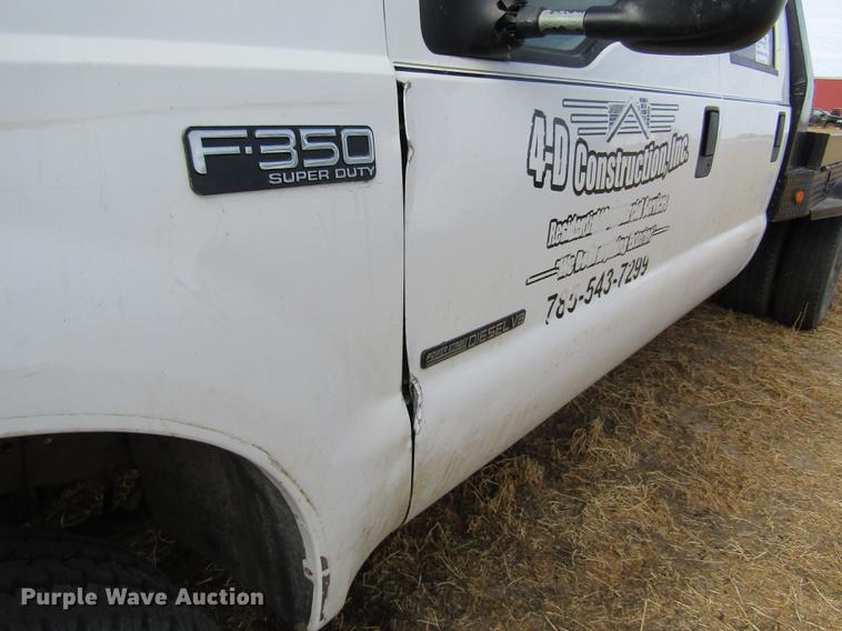 image for item DB6647 2001 Ford F350 Super Duty Crew Cab flatbed pickup truck