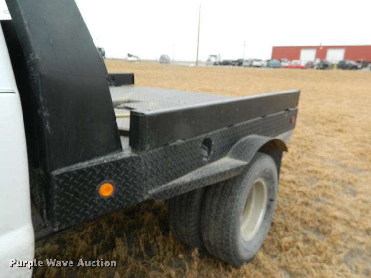 image for item DB6647 2001 Ford F350 Super Duty Crew Cab flatbed pickup truck