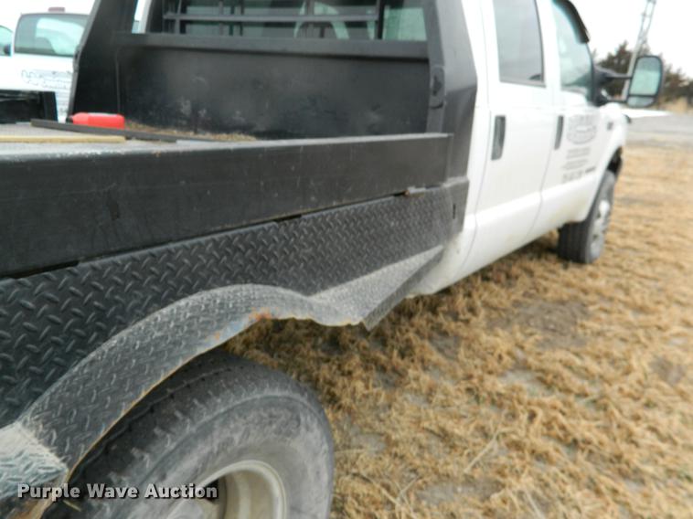 image for item DB6647 2001 Ford F350 Super Duty Crew Cab flatbed pickup truck