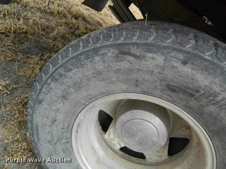 image for item DB6647 2001 Ford F350 Super Duty Crew Cab flatbed pickup truck