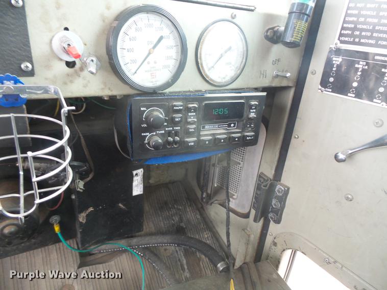 image for item DB8036 1988 Oshkosh T2206 flatbed truck