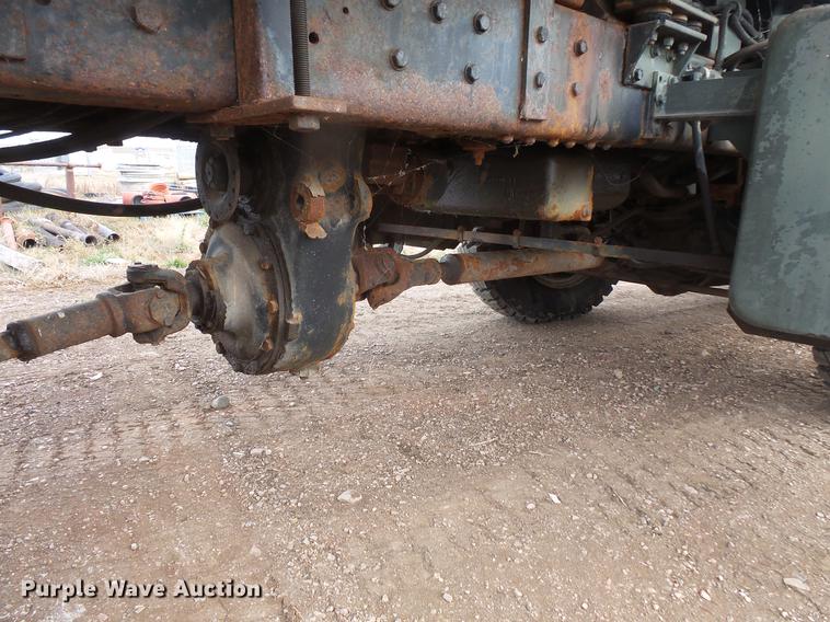 image for item DB8036 1988 Oshkosh T2206 flatbed truck