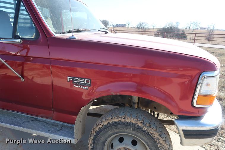 image for item DD9557 1997 Ford F350 flatbed pickup truck