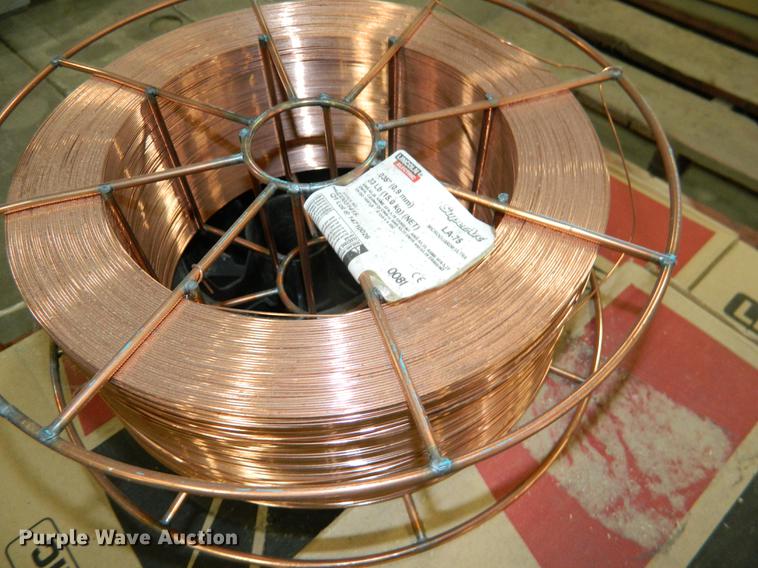 image for item DE9970 (7) spools of Lincoln SuperArc LA75 welding wire