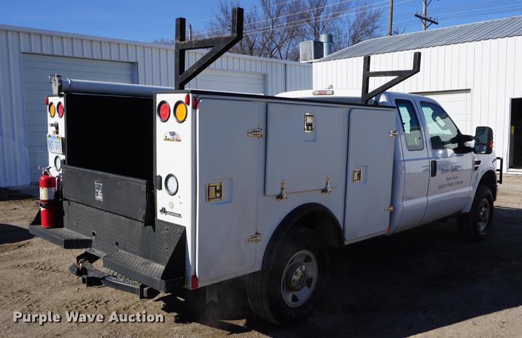 image for item DB0364 2008 Ford F250 Super Duty Super Cab utility bed pickup truck
