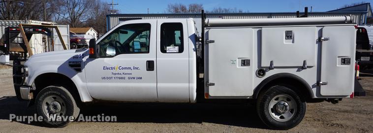 image for item DB0364 2008 Ford F250 Super Duty Super Cab utility bed pickup truck