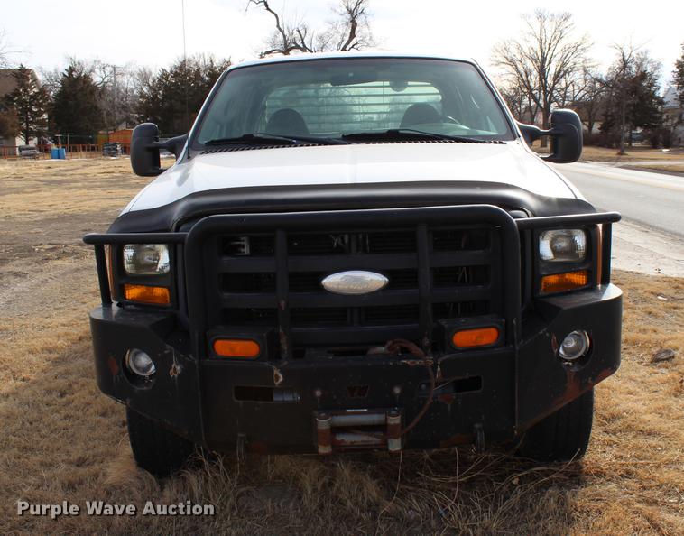 image for item DB6621 2007 Ford F350 Super Duty Crew Cab flatbed pickup truck