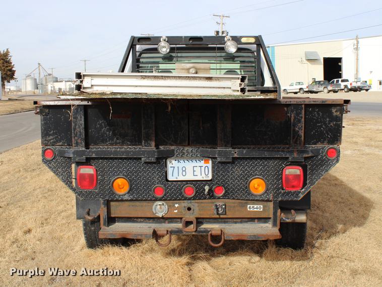 image for item DB6621 2007 Ford F350 Super Duty Crew Cab flatbed pickup truck