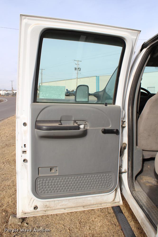 image for item DB6621 2007 Ford F350 Super Duty Crew Cab flatbed pickup truck