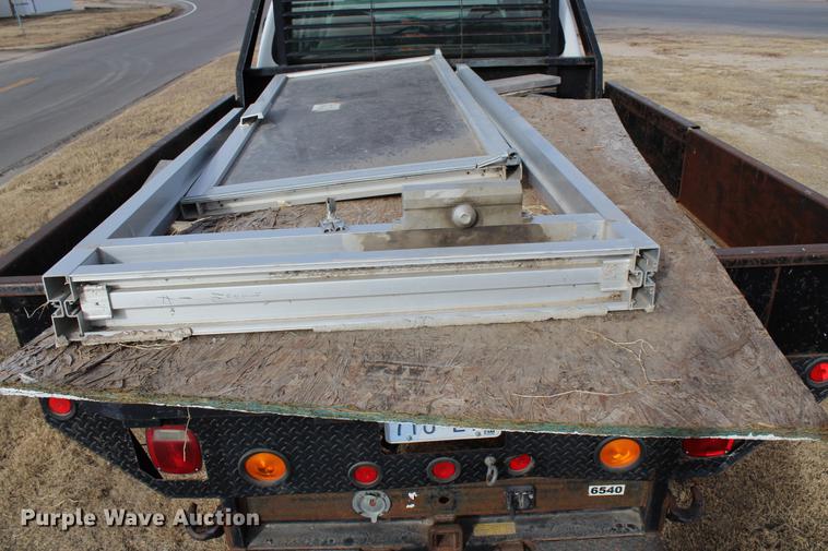 image for item DB6621 2007 Ford F350 Super Duty Crew Cab flatbed pickup truck