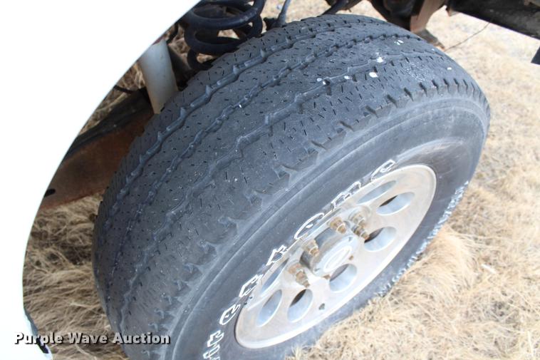 image for item DB6621 2007 Ford F350 Super Duty Crew Cab flatbed pickup truck