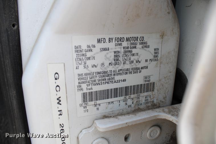 image for item DB6621 2007 Ford F350 Super Duty Crew Cab flatbed pickup truck