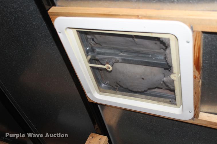 image for item DB6633 2009 Pace American DB716TA2 enclosed cargo trailer with gutter machine