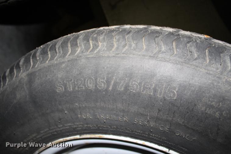 image for item DB6633 2009 Pace American DB716TA2 enclosed cargo trailer with gutter machine