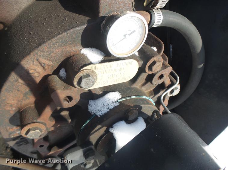 image for item DB9809 2004 Freightliner M2106 vacuum truck