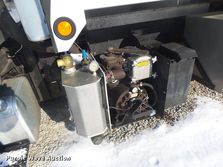 image for item DB9809 2004 Freightliner M2106 vacuum truck