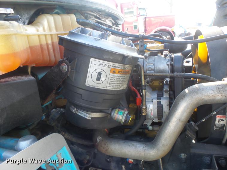 image for item DB9809 2004 Freightliner M2106 vacuum truck