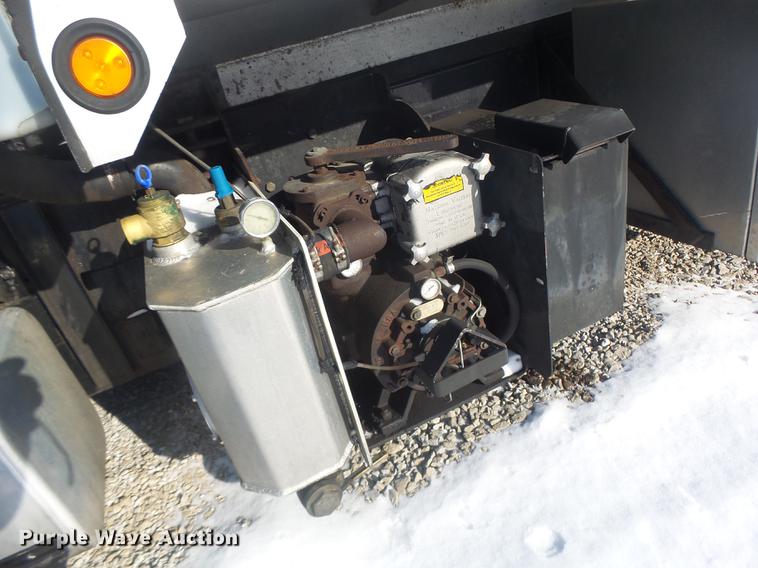 image for item DB9809 2004 Freightliner M2106 vacuum truck