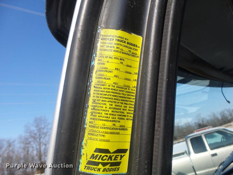 image for item DB9809 2004 Freightliner M2106 vacuum truck