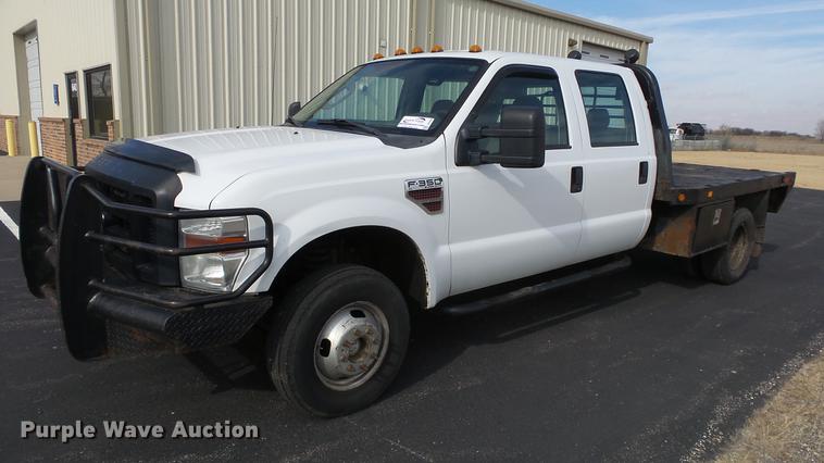 image for item DC0562 2009 Ford F350 Super Duty Crew Cab flatbed truck