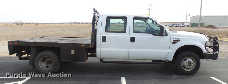 image for item DC0562 2009 Ford F350 Super Duty Crew Cab flatbed truck