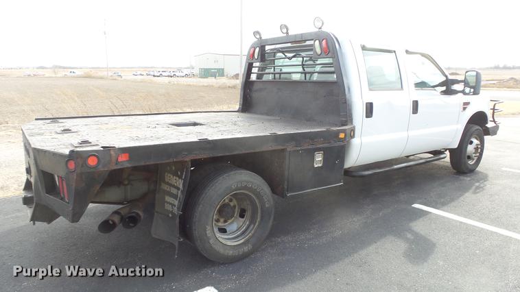 image for item DC0562 2009 Ford F350 Super Duty Crew Cab flatbed truck