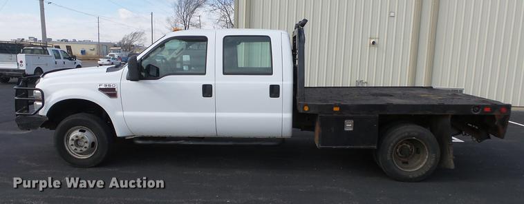 image for item DC0562 2009 Ford F350 Super Duty Crew Cab flatbed truck