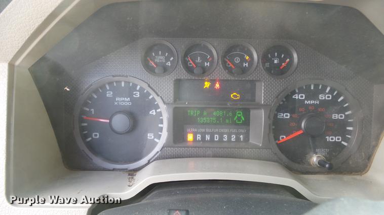 image for item DC0562 2009 Ford F350 Super Duty Crew Cab flatbed truck