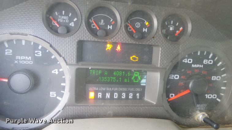 image for item DC0562 2009 Ford F350 Super Duty Crew Cab flatbed truck