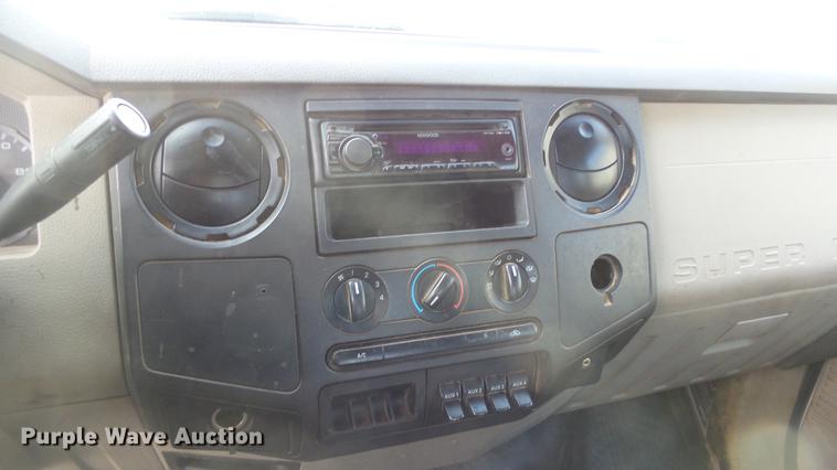 image for item DC0562 2009 Ford F350 Super Duty Crew Cab flatbed truck