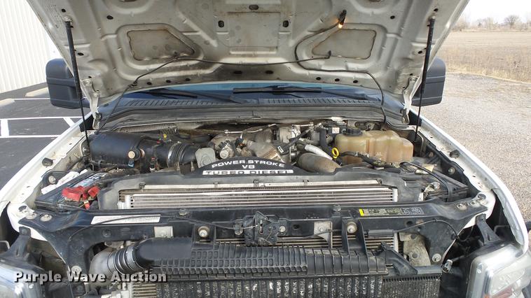 image for item DC0562 2009 Ford F350 Super Duty Crew Cab flatbed truck