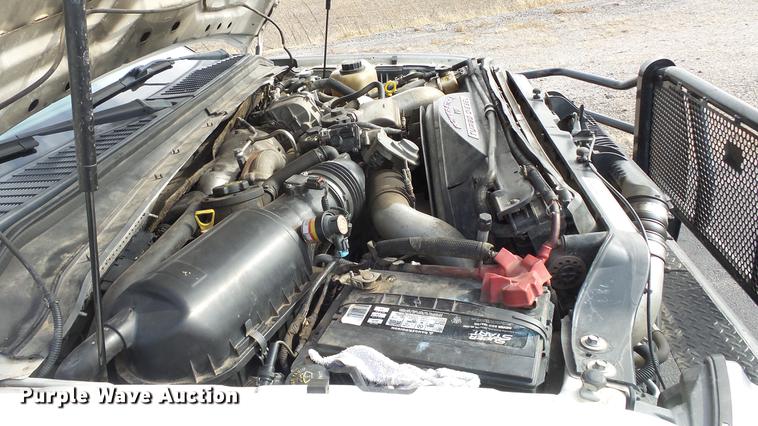 image for item DC0562 2009 Ford F350 Super Duty Crew Cab flatbed truck