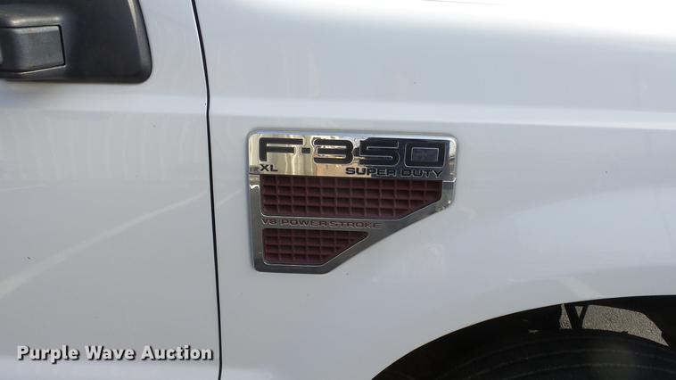 image for item DC0562 2009 Ford F350 Super Duty Crew Cab flatbed truck