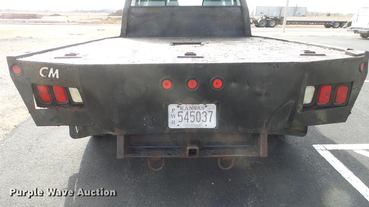 image for item DC0562 2009 Ford F350 Super Duty Crew Cab flatbed truck