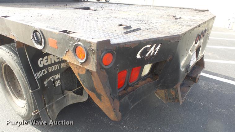 image for item DC0562 2009 Ford F350 Super Duty Crew Cab flatbed truck