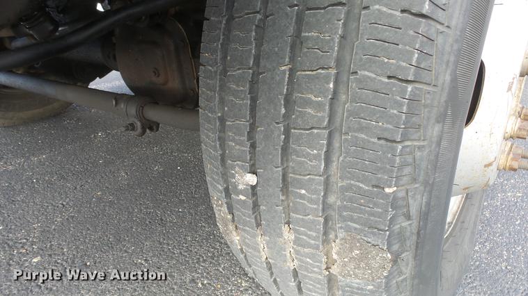 image for item DC0562 2009 Ford F350 Super Duty Crew Cab flatbed truck