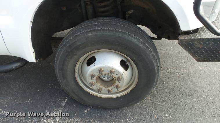 image for item DC0562 2009 Ford F350 Super Duty Crew Cab flatbed truck