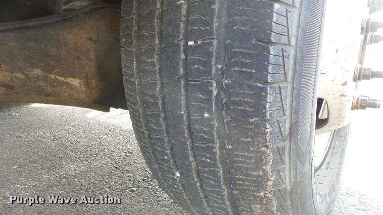 image for item DC0562 2009 Ford F350 Super Duty Crew Cab flatbed truck