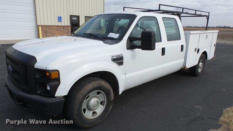 image for item DC0564 2008 Ford F350 Crew Cab utility bed pickup truck