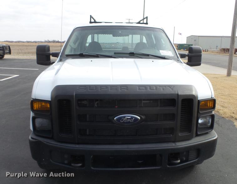 image for item DC0564 2008 Ford F350 Crew Cab utility bed pickup truck