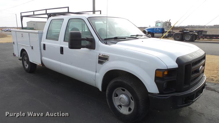 image for item DC0564 2008 Ford F350 Crew Cab utility bed pickup truck