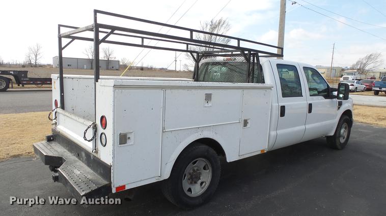 image for item DC0564 2008 Ford F350 Crew Cab utility bed pickup truck