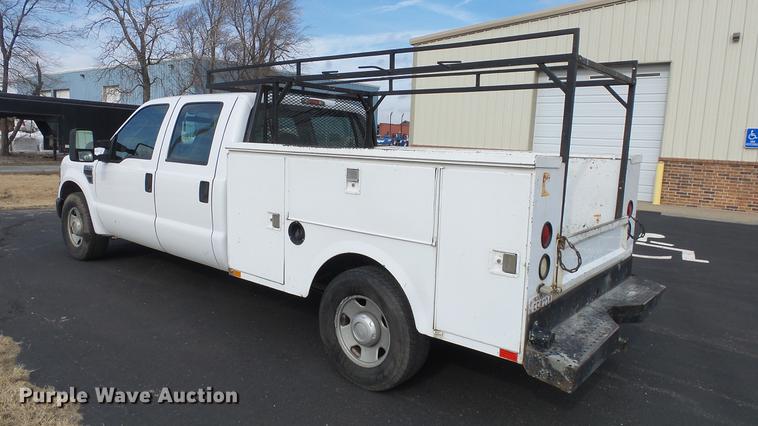 image for item DC0564 2008 Ford F350 Crew Cab utility bed pickup truck
