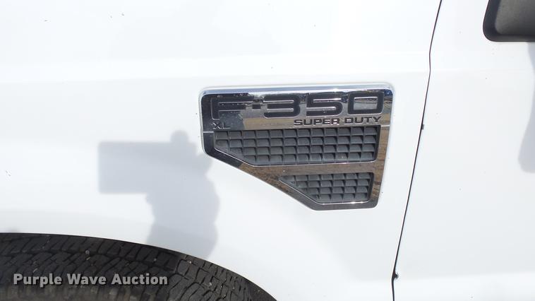 image for item DC0564 2008 Ford F350 Crew Cab utility bed pickup truck