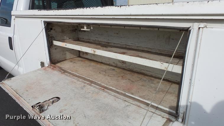 image for item DC0564 2008 Ford F350 Crew Cab utility bed pickup truck